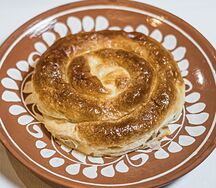 Запеченная плацында с картофелем