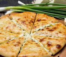 Осетинский пирог с сыром и зеленым луком