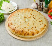 Осетинский пирог с сыром и зеленым луком