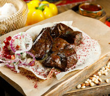 Шашлык из говяжьей печени на мангале