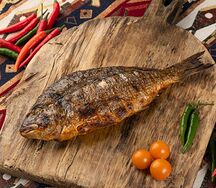 Дорада на мангале