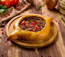 Хачапури по-аджарски с чашушули