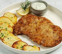 Свиная отбивная с запечённым картофелем
