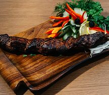 Шашлык из говяжьей печени в сетке