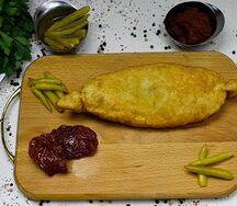 Пирожок с капустой жареный