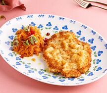 Свиной шницель с тушеной квашеной капустой