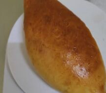 Пирожок с рисом и яйцо