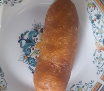 Сосиска в тесте жареная