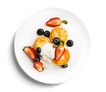 Сырники с голубикой и клубникой