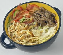 Куксу с говядиной на горячем бульоне