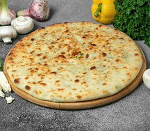 Осетинский пирог с грибами, сыром и зеленью