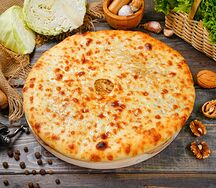 Осетинский пирог с грецким орехом и капустой