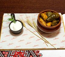 Голубцы с говядиной в винoградном и капустном листе