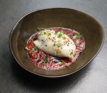 Кальмар, фаршированный овощами