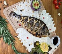 Дорадо на мангале