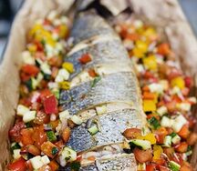 Сибас в печи с овощами