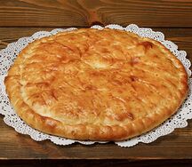 Осетинский пирог с сыром и зеленью