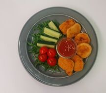 Куриные наггетсы с овощами