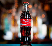 В стекле Coca-Cola