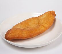 Пирожок с картошкой жареный