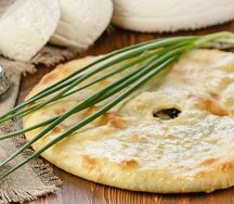 Осетинский пирог с сыром и зеленым луком