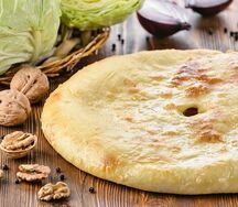 Осетинский пирог с капустой, сыром и орехами