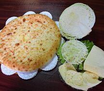 Осетинский пирог с сыром и капустой