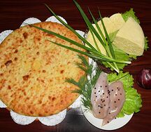 Осетинский пирог с курицей, сыром и луком