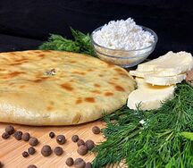 Осетинский пирог с сыром, творогом и зеленью