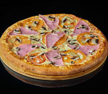 Пицца с ветчиной и грибами