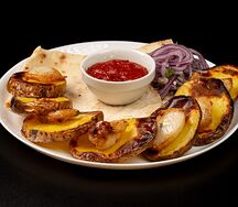 Молодой картофель на углях с курдюком