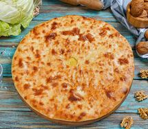 Осетинский пирог с капустой и грецким орехом