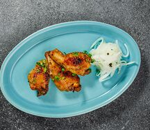 Куриные крылышки с черным перцем
