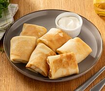 Большая порция блинчиков с мясом