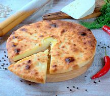 Осетинский пирог с сыром и зеленью