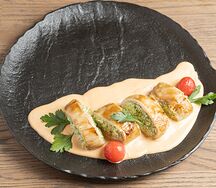 Кальмар фаршированный с соусом том ям