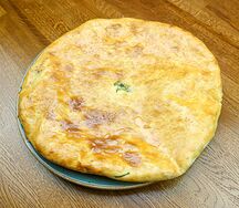 Осетинский пирог с сыром и зеленью