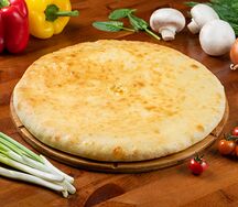 Осетинский пирог с сыром и зелёным луком