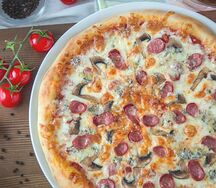 Пицца Деликатесная