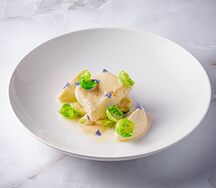 Палтус с сезонными овощами, кремом из сельдерея и соусом из эстрагона