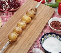 Картошка с бараньим салом на мангале