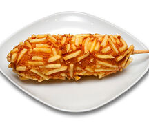Корн-дог с сосиской и сыром моцарелла