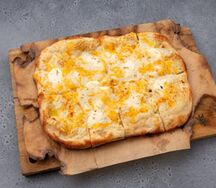 Пицца четыре сыра