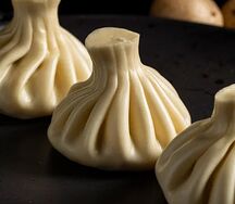 Хинкали с сыром и помидорами 