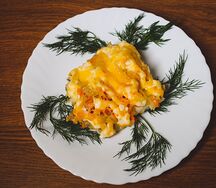 Минтай, запеченный с овощами