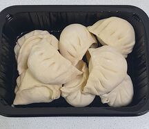 Вареники с сыром сулугуни, творогом и пряными травами