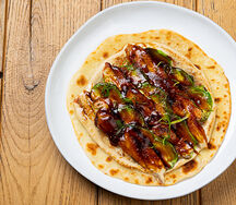 Лепёшка роти с угрём, авокадо, соус тоннато