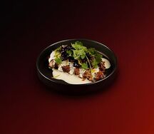 Свиные рёбра с древесными грибами и цитрусовым соусом