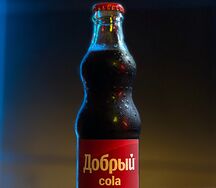 Добрый Cola в стекле 