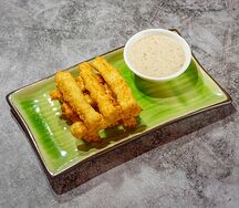 Тофу в кляре с ореховым соусом